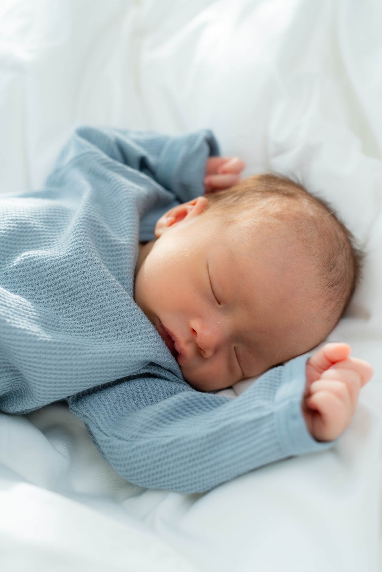 Newborn baby sleep on bed